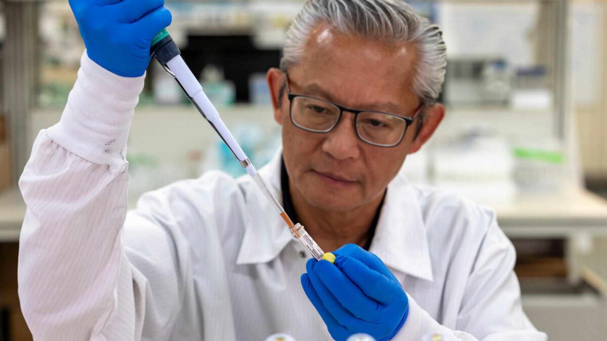 Scientist in lab running infectious disease quality controls